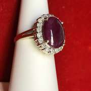 14K GOLD LADIES DIAMOND AND RUBY RING.