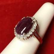 14K GOLD LADIES DIAMOND AND RUBY RING.