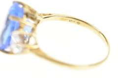10K Yellow Gold Oval Three Stone Syn. Sapphire Trillion CZ Ring