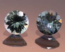 Glittering 1.30ct pair of silvery blue Tanzanite