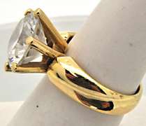 14K GOLD LADIES HUGE CZ RING WITH MATCHING STUDS