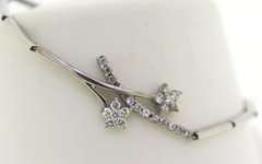 18K White Gold Bracelet With Flower Details