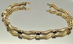 LADIES 14 KT YELLOW GOLD DIAMOND AND SAPPHIRE BRACELET.