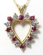Adorable Ruby & Diamond Accent Heart Necklace in Yellow Gold