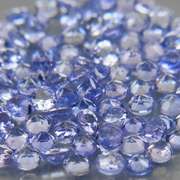 Heavy flashing 3.85ct diamond cut Tanzanite set