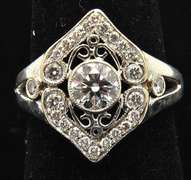 LADIES 14 KT WHITE GOLD ANTIQUE STYLE DIAMOND RING.