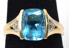 Eye-Catching Blue Topaz & Diamond Ring in 14KT Yellow Gold