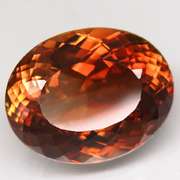 Exquisite 22.30ct whiskey red Imperial Topaz
