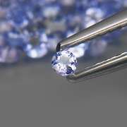 Heavy flashing 3.85ct diamond cut Tanzanite set