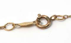 Adorable Ruby & Diamond Accent Heart Necklace in Yellow Gold