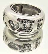LADIES 18 KT WHITE GOLD DIAMOND 'LOVE' RING.