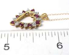 Adorable Ruby & Diamond Accent Heart Necklace in Yellow Gold