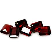Heavy 10.41ct untreated emerald cut Garnet set