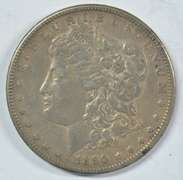 Scarce 1890-CC Morgan Silver Dollar. Upper end circ
