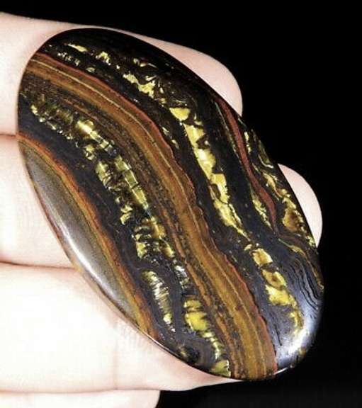 Dramatic 95ct Tiger Eye cabochon
