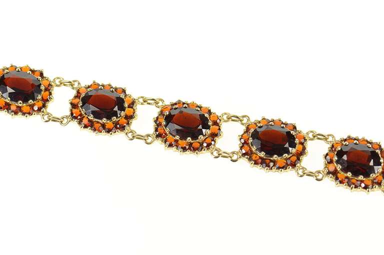 10K Yellow Gold Oval Garnet Halo Encrusted Statement Bracelet