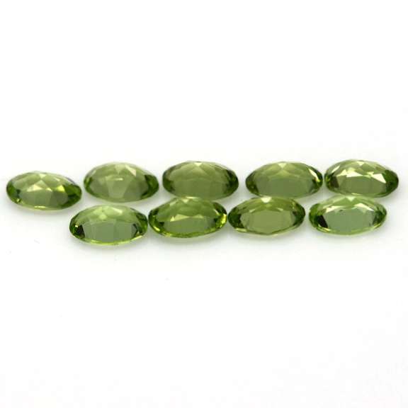 Dazzling 4.10ct untreated lime green Peridot set