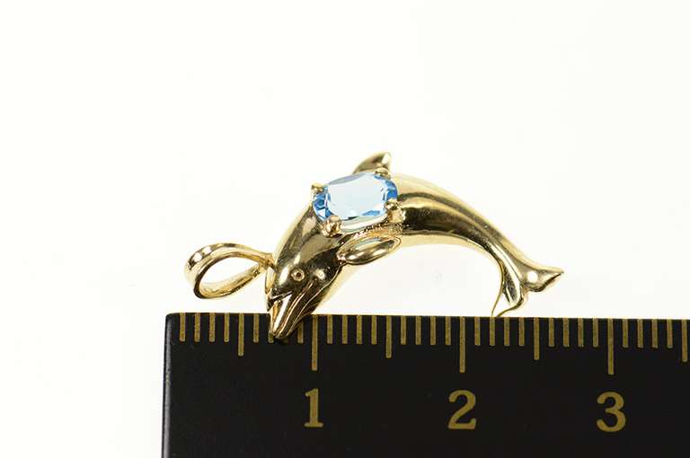 10K Yellow Gold Oval Blue Topaz Jumping Dolphin Pendant