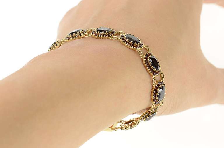10K Yellow Gold Oval Garnet Halo Encrusted Statement Bracelet
