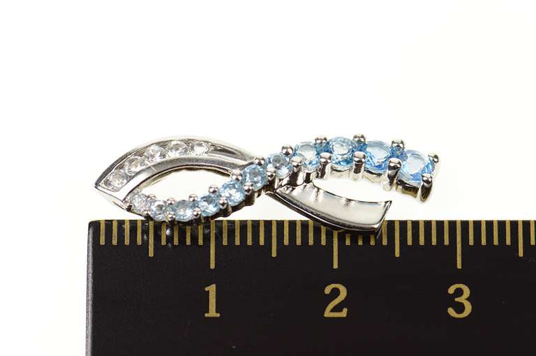 10K White Gold Blue Topaz Cubic Zirconia Criss Cross Wavy Pendant