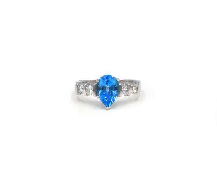 Lovely White Gold Blue Topaz and Diamond Ring