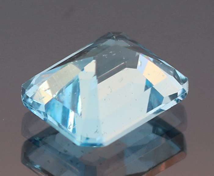 Vibrant 5.43ct 9x11mm emerald cut Topaz