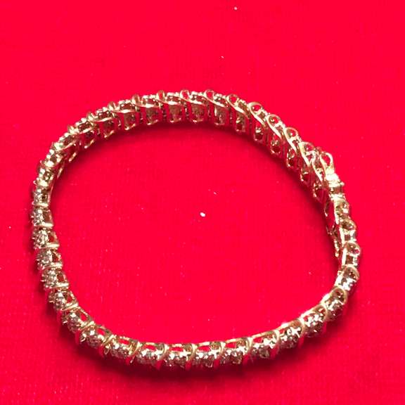 LADIES 14K GOLD AND DIAMOND BRACELET