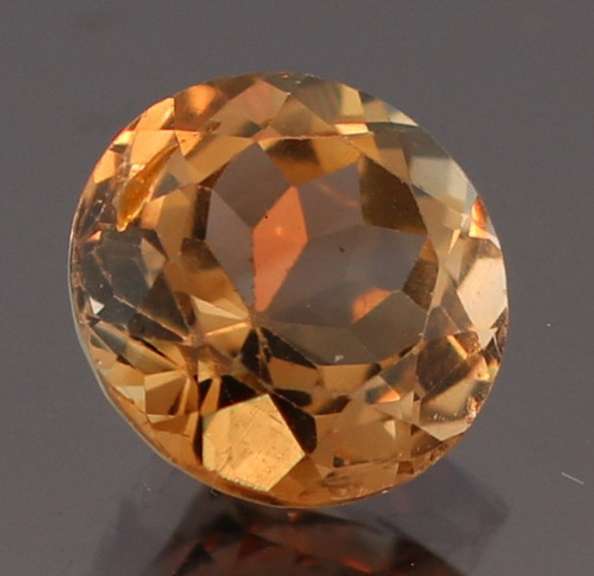 Exciting 3.47ct 9mm Imperial Topaz solitaire