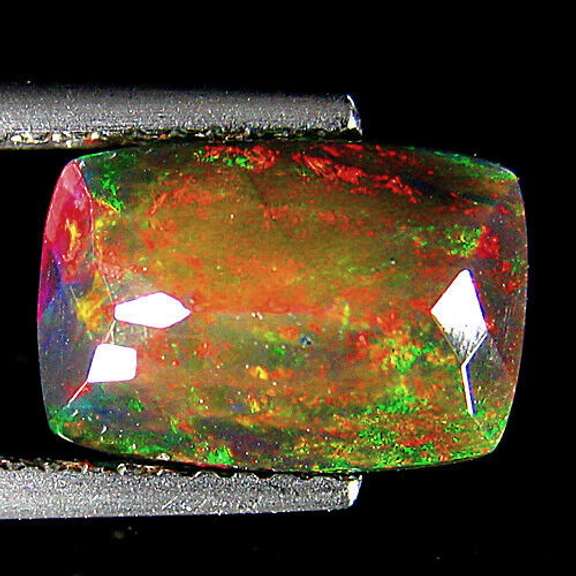 Captivating 2.07ct floral and fairy fire black Opal