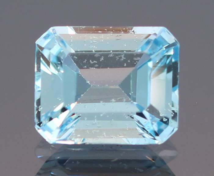 Vibrant 5.43ct 9x11mm emerald cut Topaz