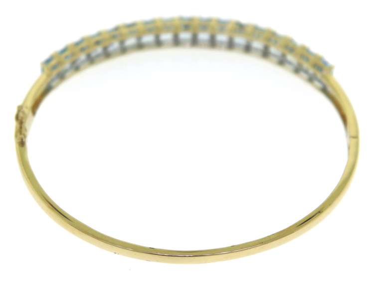 Glamorous 14kt Yellow Gold Hinged Blue Topaz Bangle Bracelet