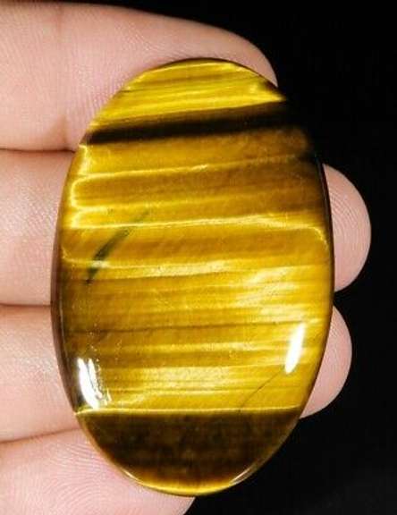 Full body shimmer! 80.54ct Golden Tiger Eye cabochon