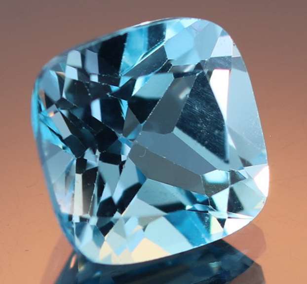 Huge! 12.62ct radiant cut Swiss blue Topaz