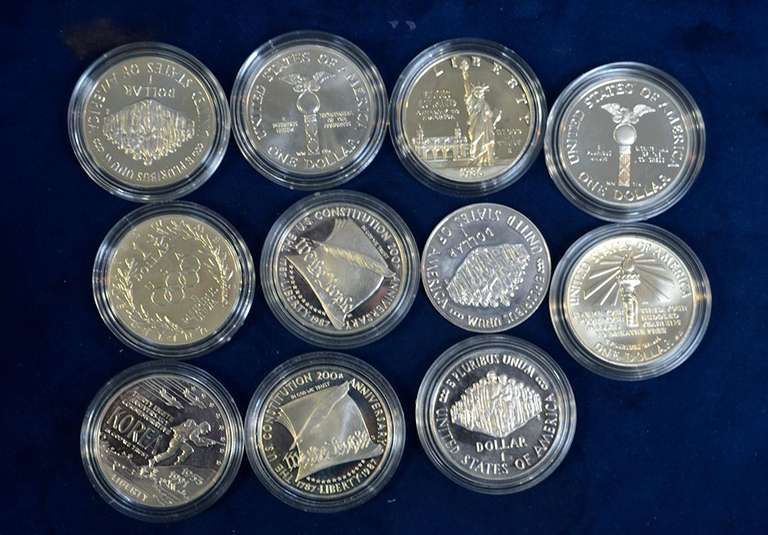 Lot of 11 Commemorative Silver Dollars