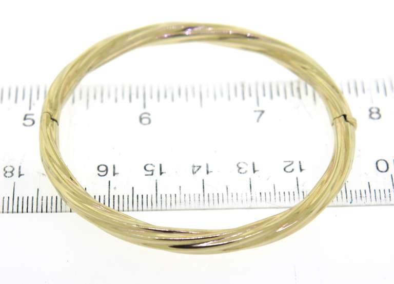 Simple 14kt YG Twist Motif Hinged Bangle Bracelet
