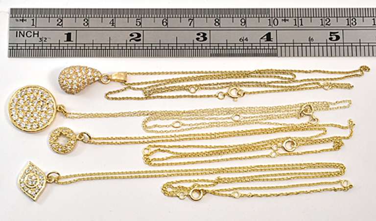 Quartet of Pendant Necklaces in Vermeil