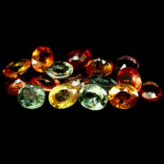 Heated only! Vibrant 7.89ct fancy color Sapphire set