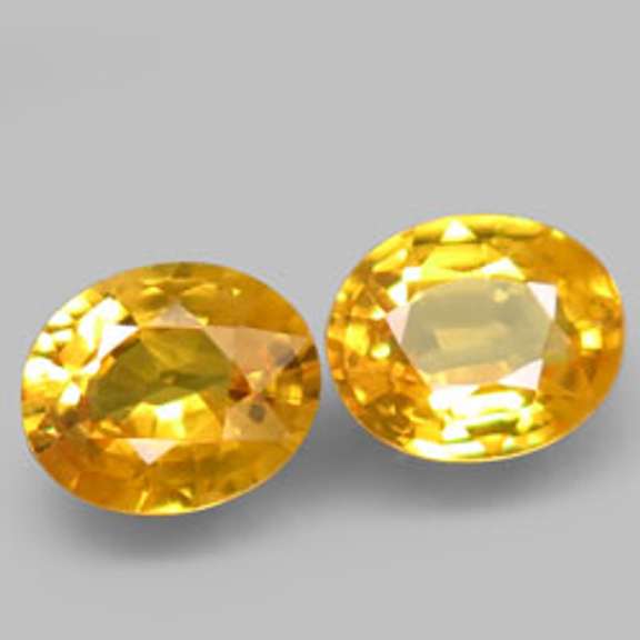 Glittering 1.26ct pair of golden Songean Sapphires