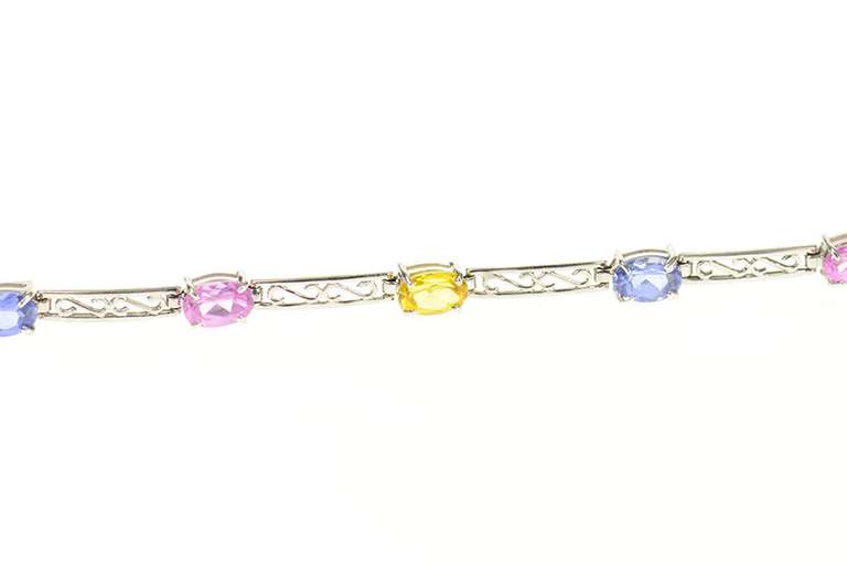 10K White Gold Scroll Filigree Bar Oval Syn. Sapphire Bracelet