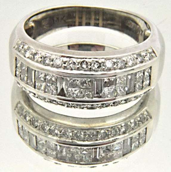 LADIES 14 KT WHITE GOLD DIAMOND BAND BY LEVIAN.