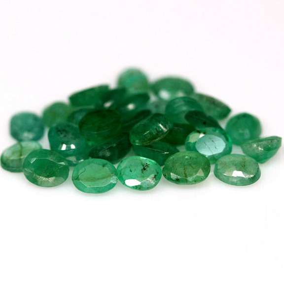 Rich green unheated 8.14ct 5x4mm Emerald set