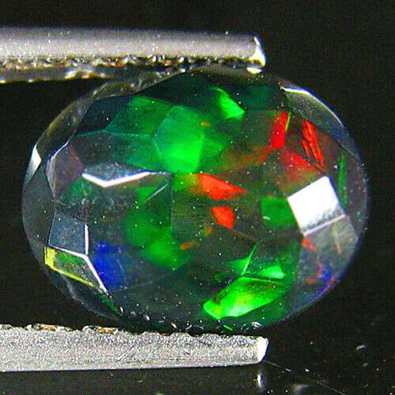Fully faceted 1.82ct oval cut Black Opal