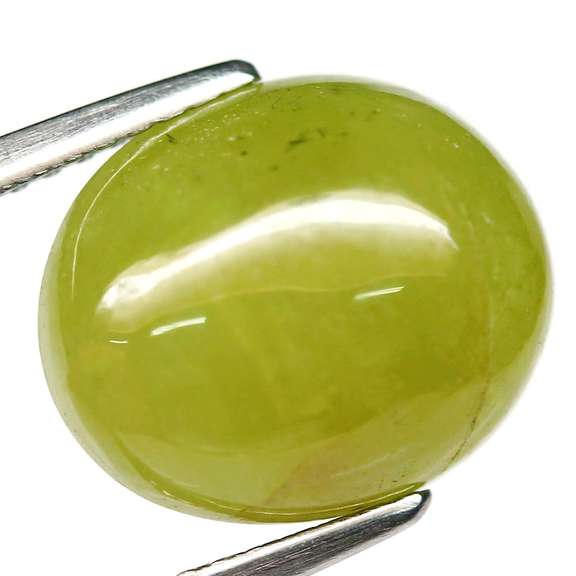 Diamond luster 6.79ct Sphene cabochon