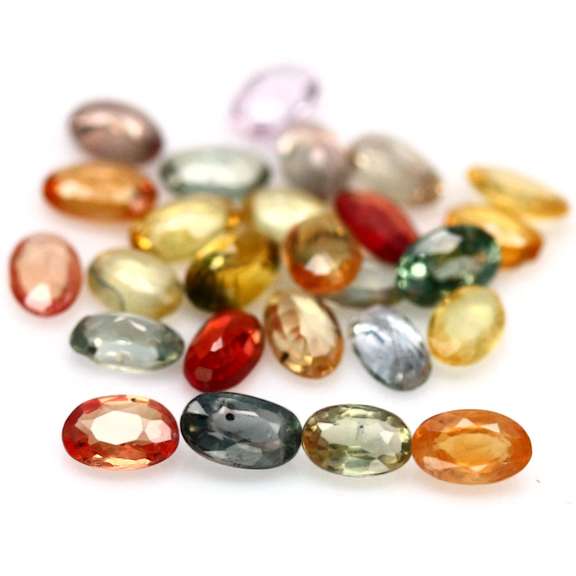 Heated only! 7.21ct fancy color Sapphire set