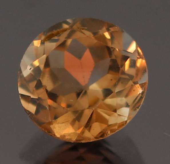 Exciting 3.47ct 9mm Imperial Topaz solitaire