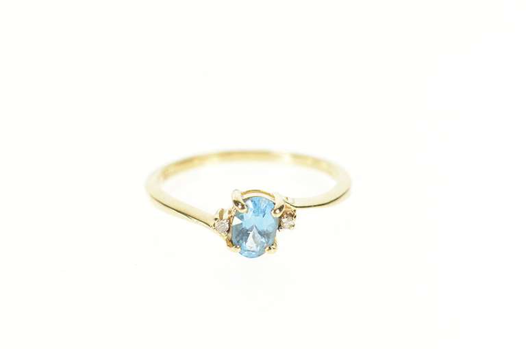 10K Yellow Gold Oval Blue Topaz Diamond Accent Bypass Ring