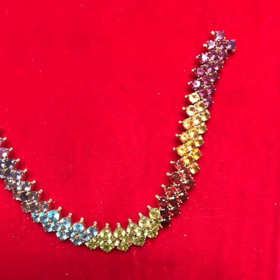Ladies 14k gold bracelet with multi color gem stones