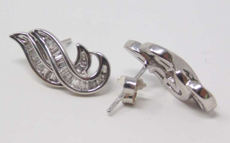 Fancy White Gold Diamond Swirl Earrings