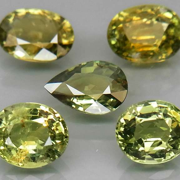 Radiant 4.24ct mixed cut 5pc Sapphire set