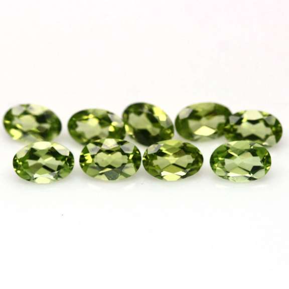 Dazzling 4.10ct untreated lime green Peridot set